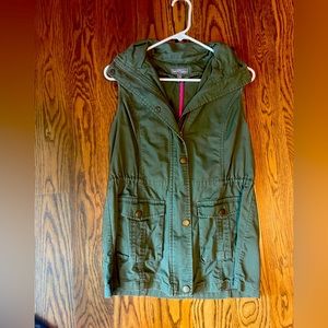 Green vest- second owner. Worn by me 3 times. Washed and hung to dry.